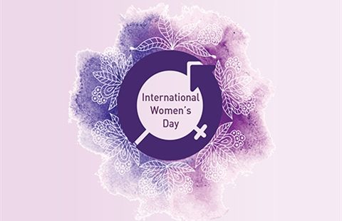 purple international women's day circle logo with drawing of flowers in white on a mottled purple background around it